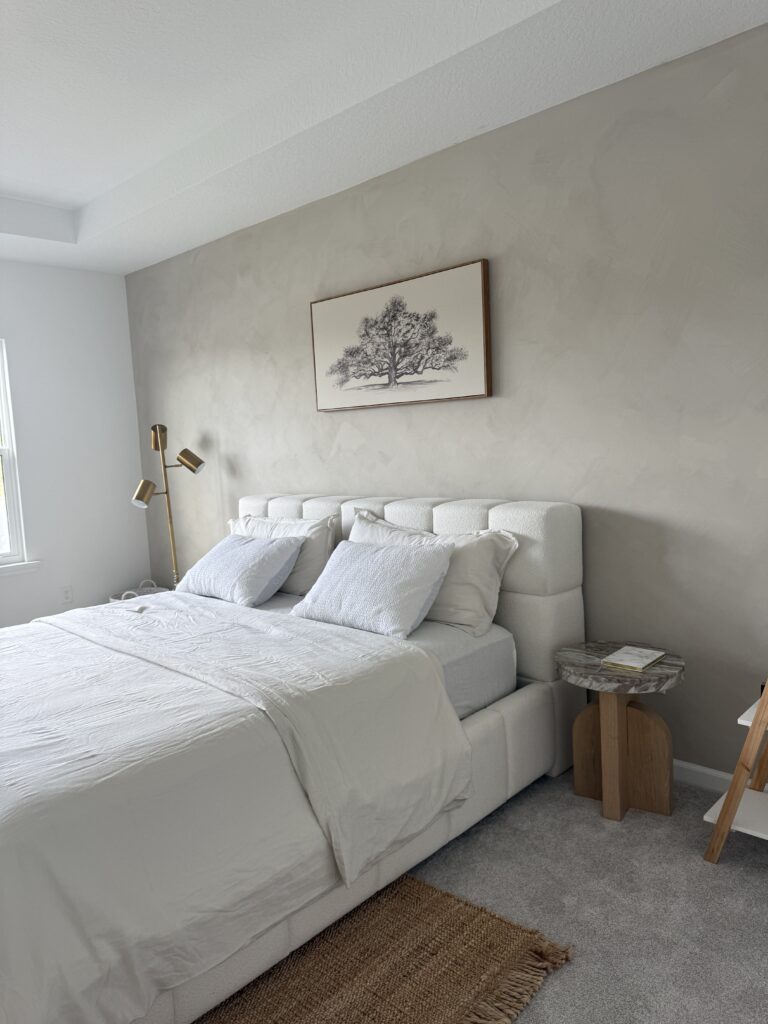 Limewash accent wall in a modern bedroom