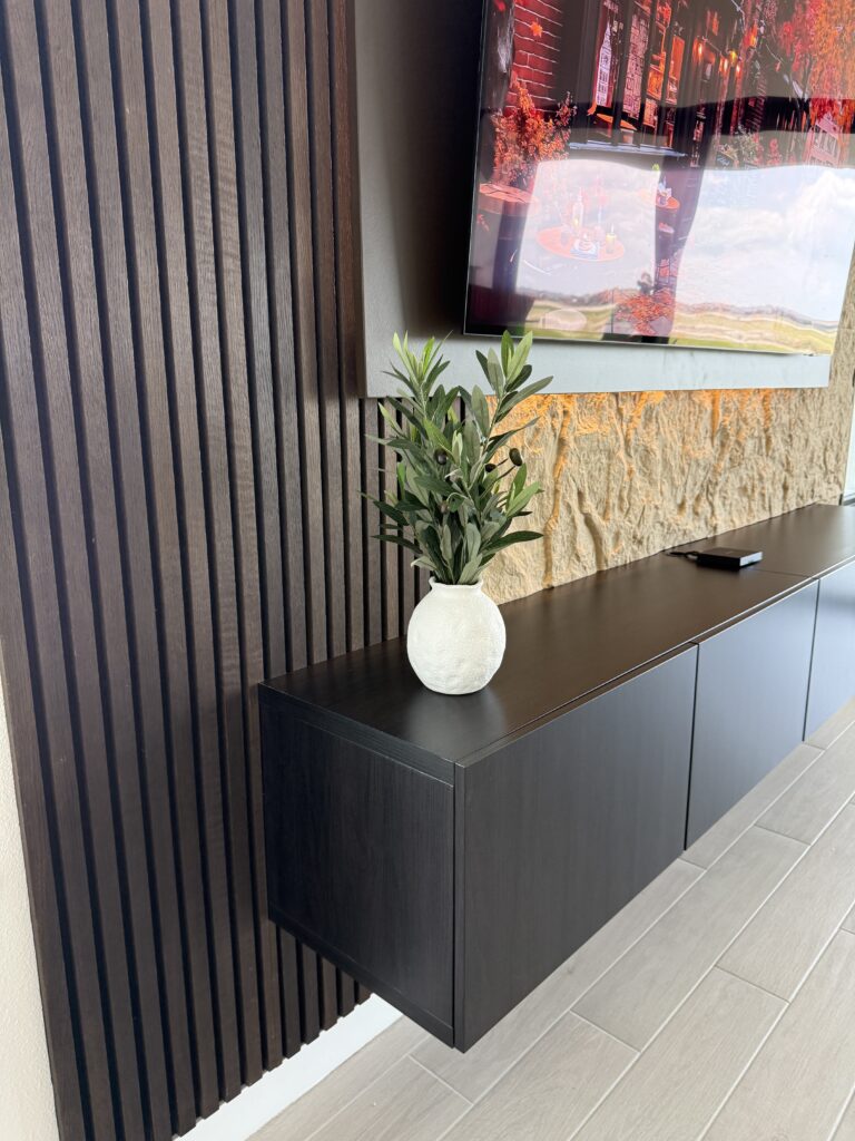 Floating Cabinet TV Media Wall Floating cabinet TV media wall with built-in storage and modern fireplace design