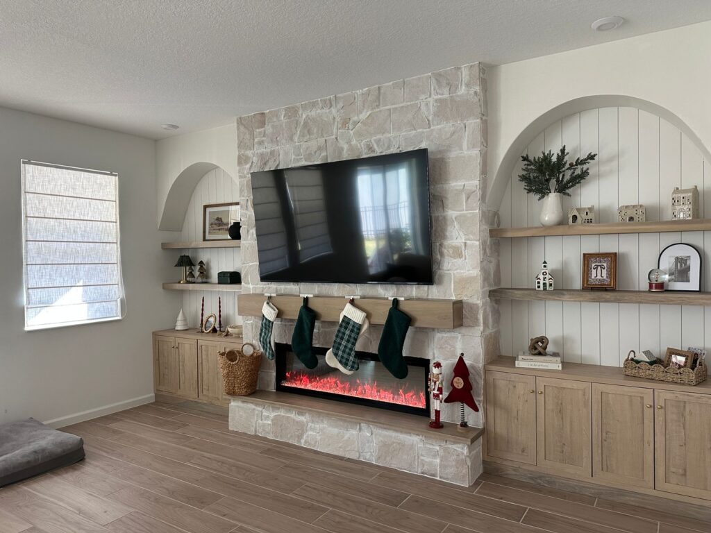 Custom Stone Fireplace TV Wall With Built-In Cabinets custom stone fireplace TV wall with built-in cabinets floating shelves and arched niches