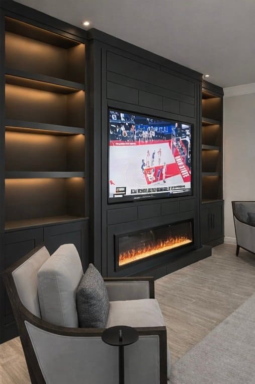 custom TV media wall with fireplace cabinetry and LED lighting