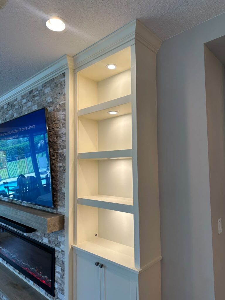 Built in shelving beside TV media wall