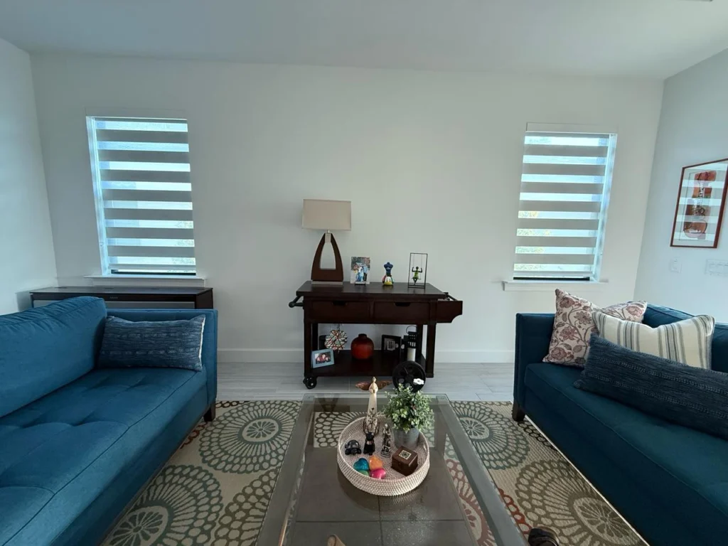 Living room before the custom dark shiplap fireplace wall installation