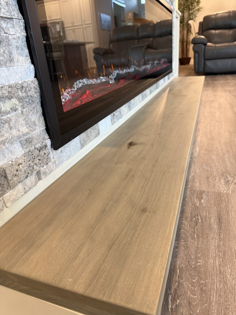 Linear fireplace in custom TV wall
