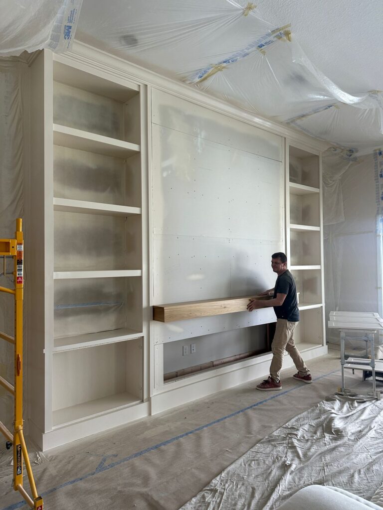 Living room wall before custom stone TV media wall installation