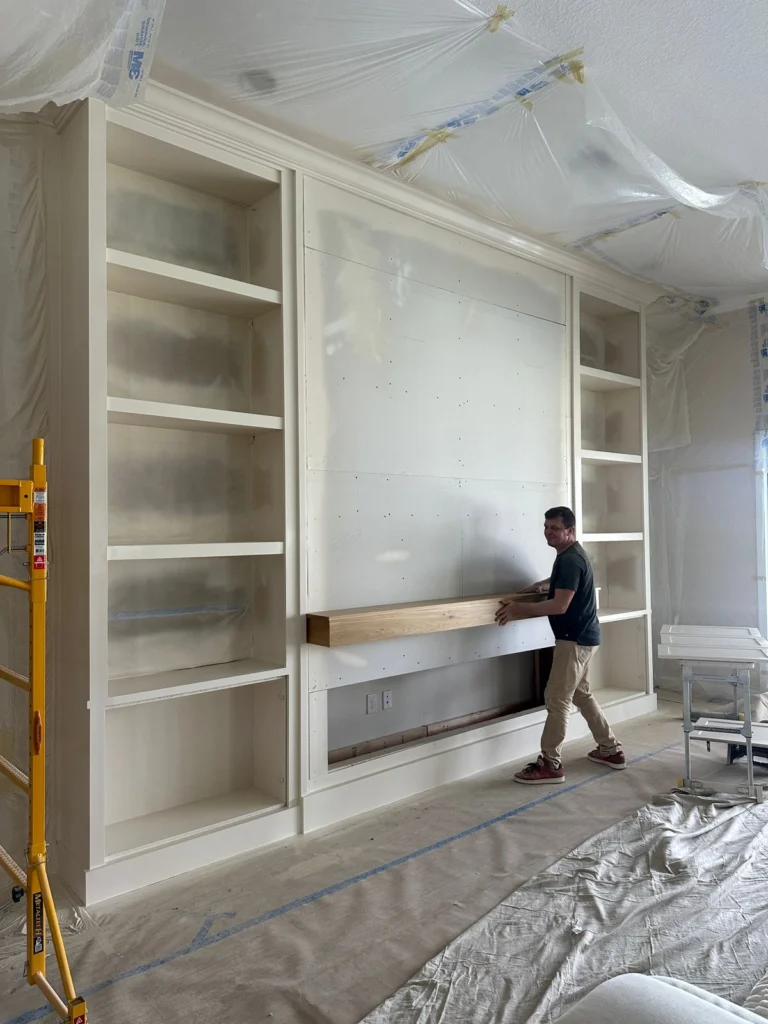 Living room wall before custom stone TV media wall installation