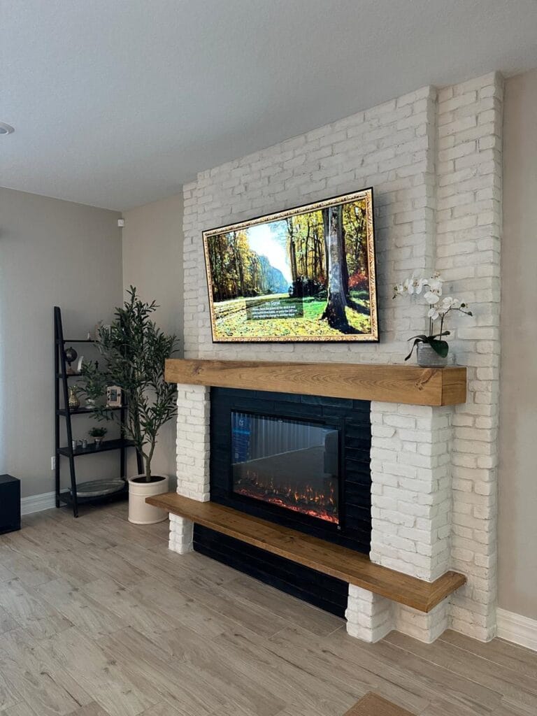 Completed white brick fireplace wall design