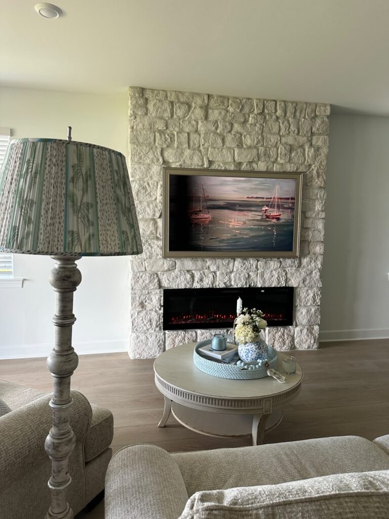 Completed limestone fireplace wall Punta Gorda in a bright Florida living room