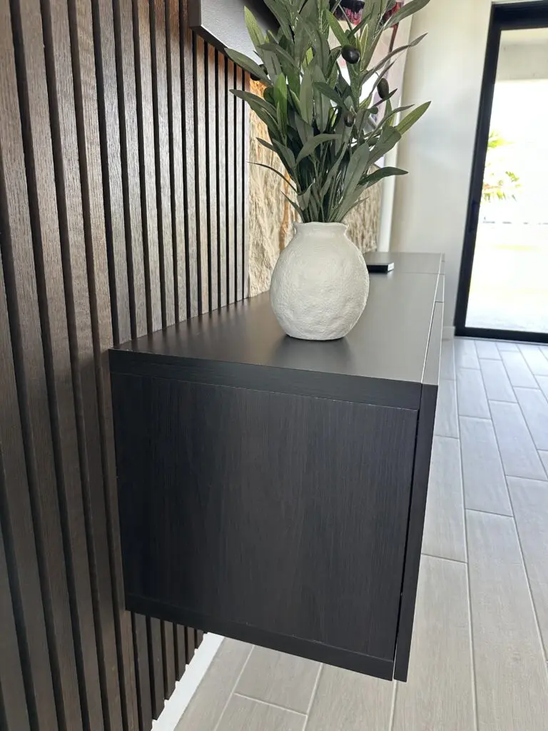 Floating Cabinet and Wood Slat Media Wall Orlando Floating cabinet and wood slat detail for a custom media wall in Orlando