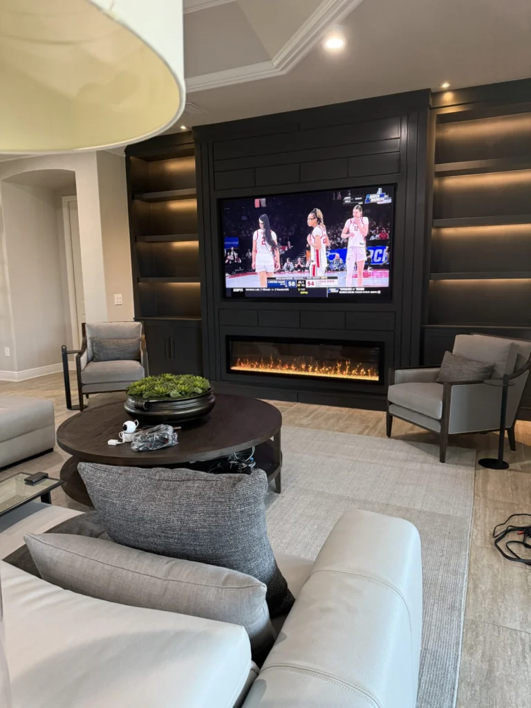 Luxury Black Entertainment Wall Luxury black entertainment wall with fireplace and illuminated shelving