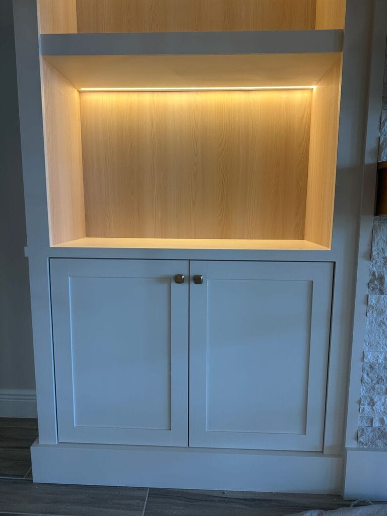 Custom LED Display Cabinet Custom built-in display cabinet with warm LED lighting and furniture-grade finish