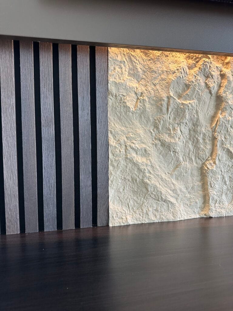 Wood Slat Accent Wall Detail Decorative wood slat wall with textured architectural finish and integrated lighting