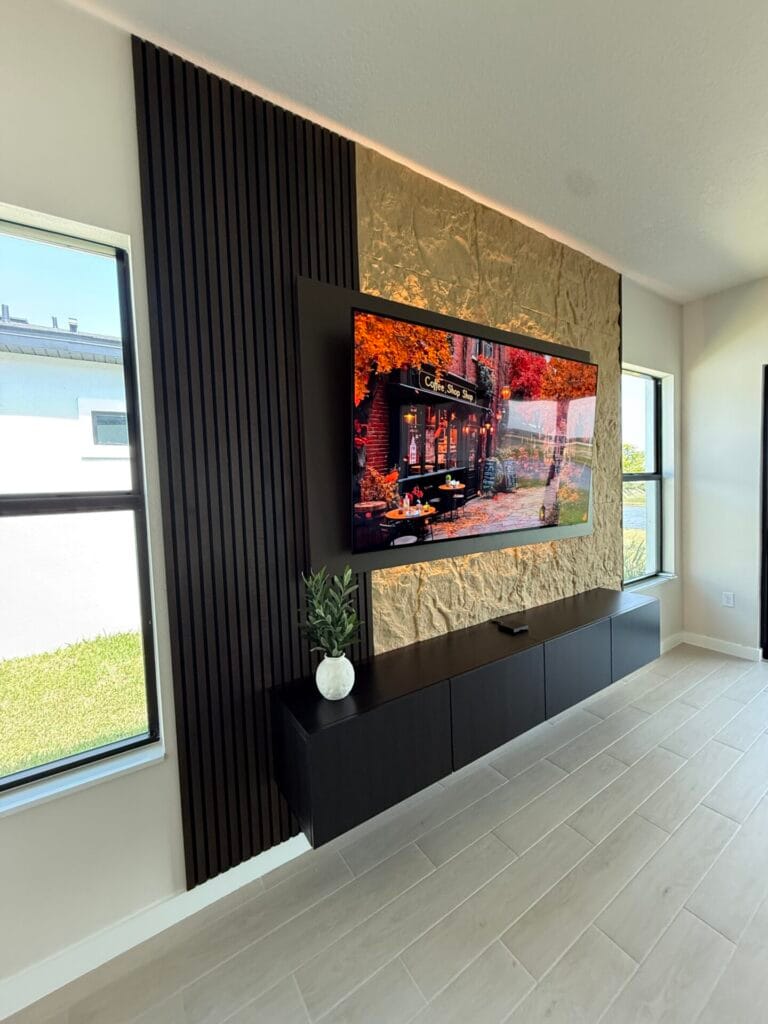 Modern Floating TV Feature Wall Modern floating TV feature wall with textured stone and wood slat accents