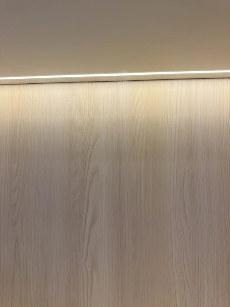 Integrated LED Shelf Lighting Detail Integrated LED shelf lighting with premium wood interior finish