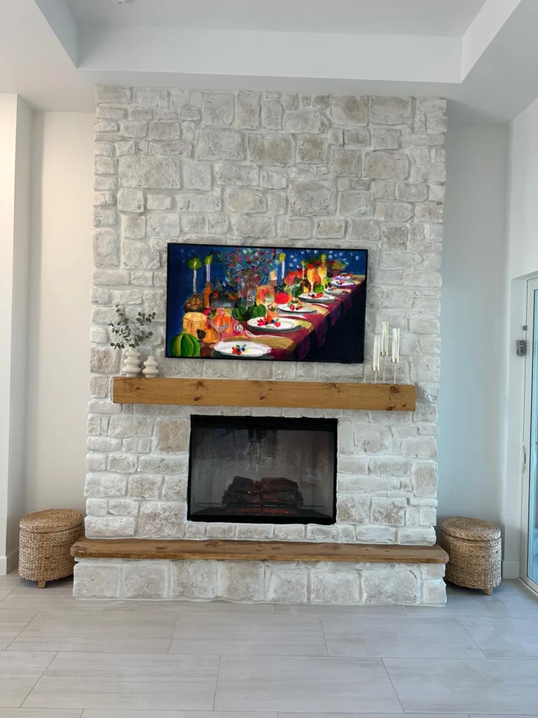 Hand-Finished Limestone Fireplace Hand-finished limestone fireplace surround with rustic wood mantel