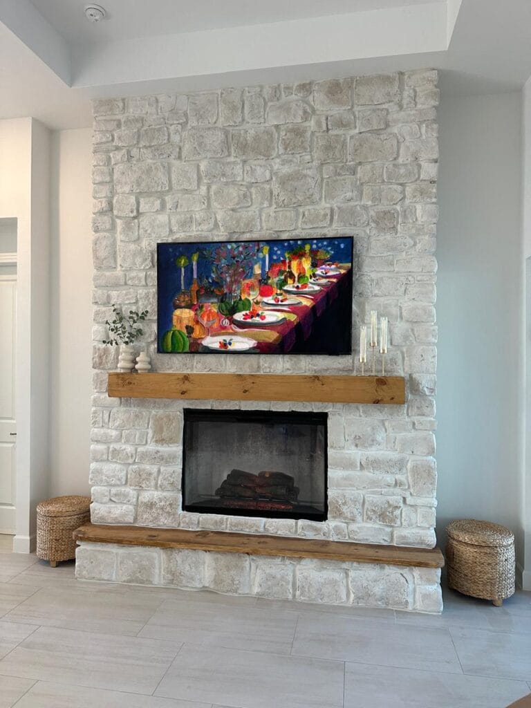 White Limestone Fireplace with Wood Mantel White limestone fireplace with solid wood mantel and custom masonry finish