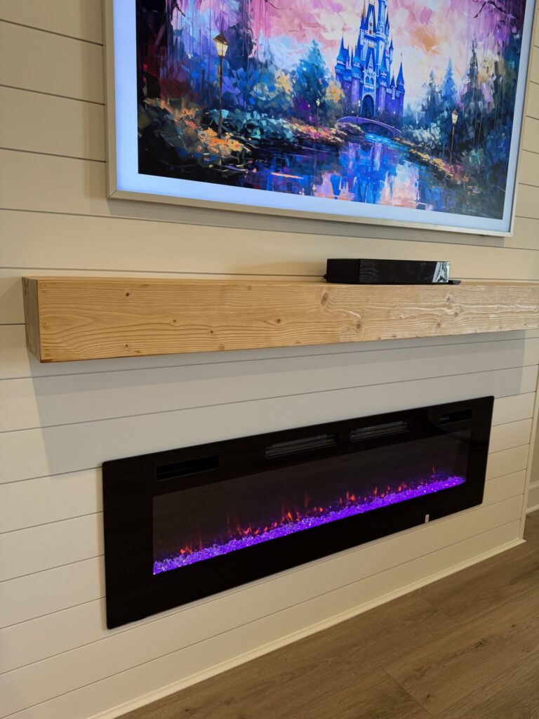 handcrafted-wood-mantel-white-shiplap-fireplace-orlando.jpg Handcrafted natural wood mantel on a finished white shiplap fireplace wall in Orlando, Florida